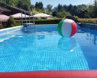 Safety barriers for swimming pools
